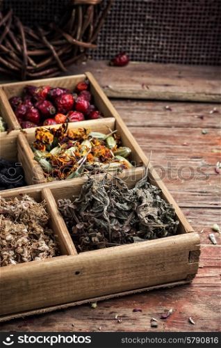 wooden box with herbs traditional medicine from home kit in the rural style