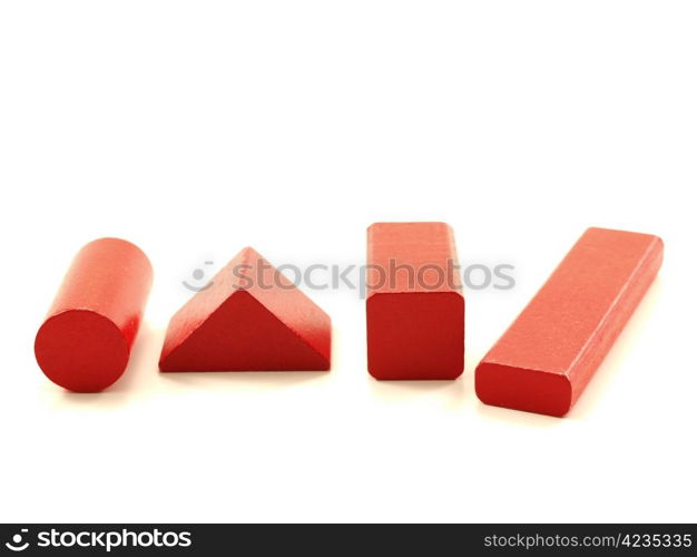 Wooden brick pieces of red color, isolated towards white