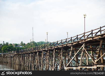 Wooden bridge across the river. Wooden bridge that spans the length of the second, Sangklaburi Kanchanaburi.