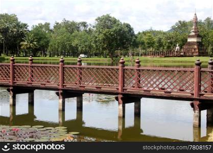 Wooden bridge and ruinse in Sukhotai, Thailand