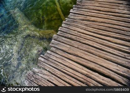 Wooden bridge for crossing over an water surface of lakes
