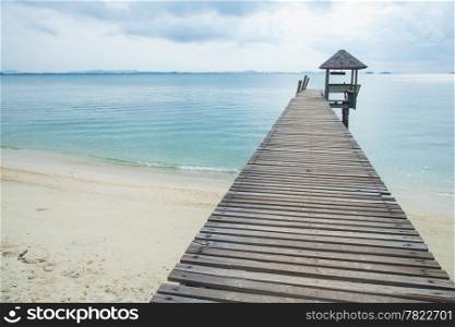 Wooden bridge into the sea. Property is located at the end of the runway into the sea.