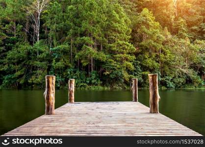 Wooden bridge on the lake. Pang Ung, Thailand.