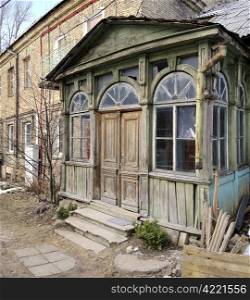 Wooden, broken house. Vintage entrance