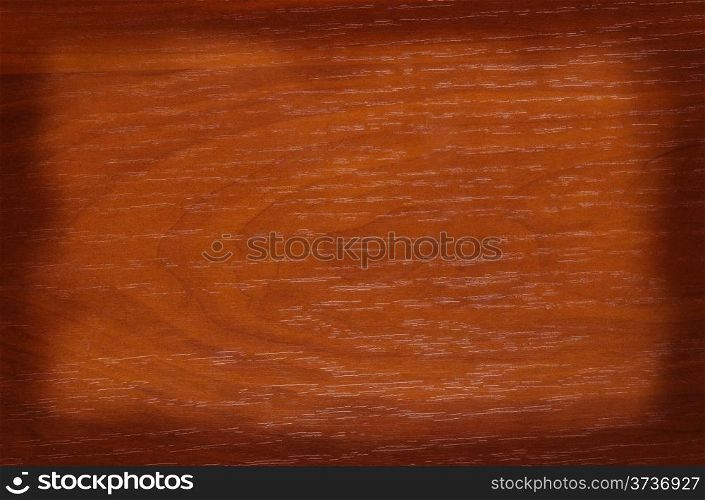 Wooden brown background with a shaded contour