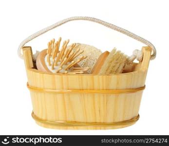 wooden bucket of spa-type items. Isolated on white