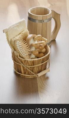 wooden bucket with mug