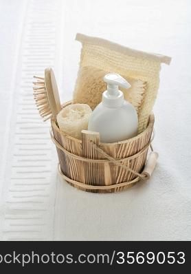 wooden bucket with objects for bathing