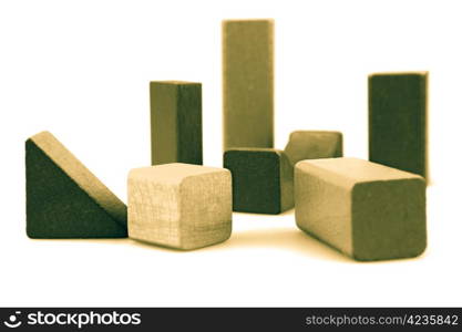 Wooden building blocks isolated on white background.