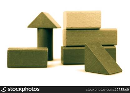 Wooden building blocks isolated on white background.