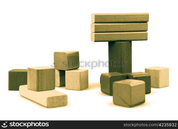 Wooden building blocks isolated on white background.