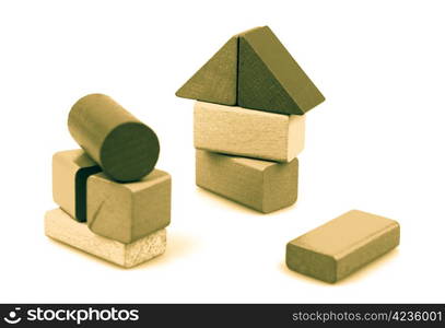 Wooden building blocks isolated on white background.