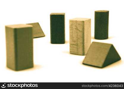 Wooden building blocks isolated on white background.