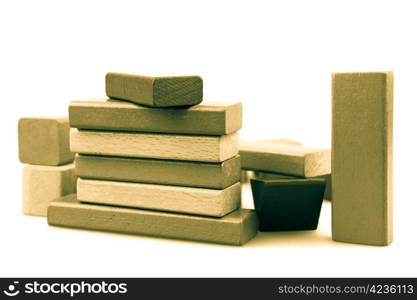 Wooden building blocks isolated on white background.