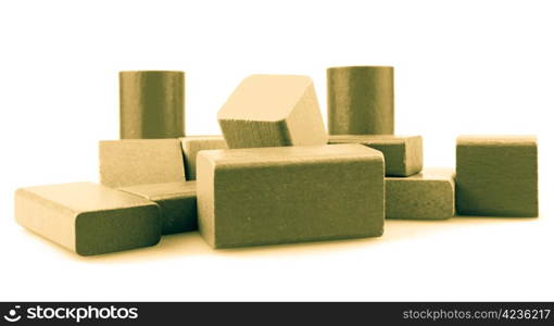 Wooden building blocks isolated on white background.