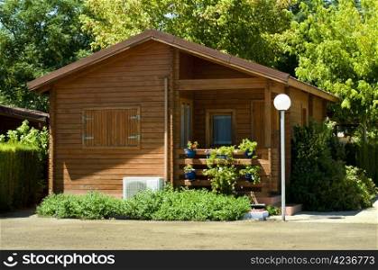 Wooden bungalow and garden