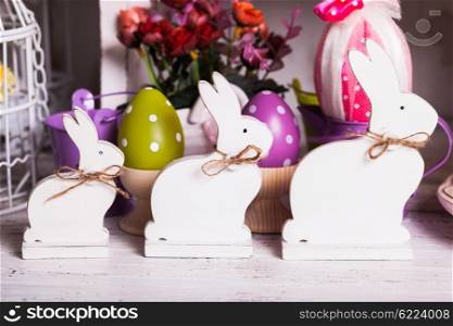 Wooden bunny - Easter decoration on the table. Easter bunny decor
