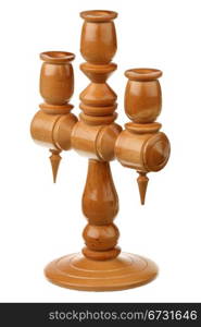 Wooden candlestick over white background