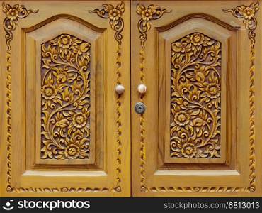 Wooden carved doors closeup