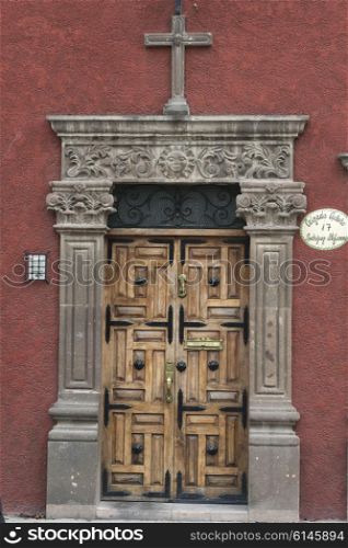 Wooden carved entrance door, Guadalupe, San Miguel de Allende, Guanajuato, Mexico