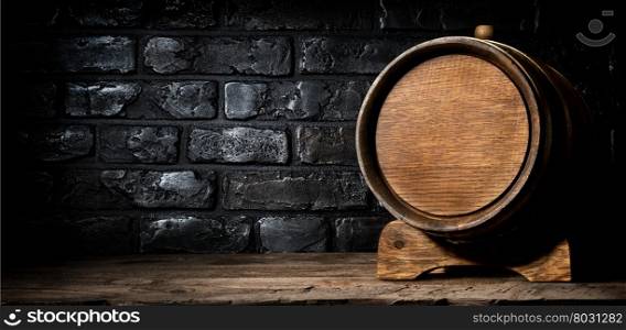 Wooden cask and wall made of bricks