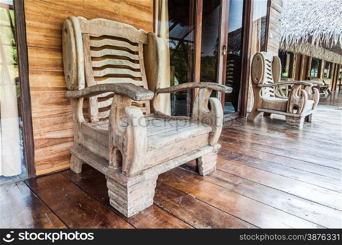 Wooden chair on raft resort in Thailand