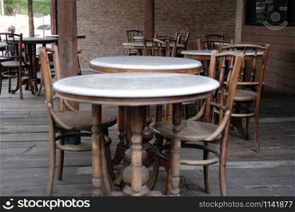 wooden chair table in cafe coffee shop restaurant. interior decoration