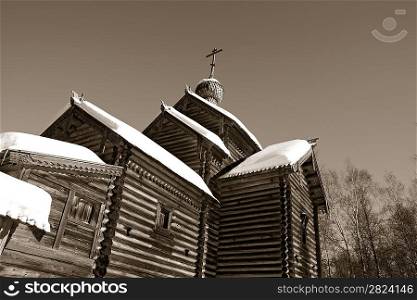 wooden chapel on celestial background, sepia