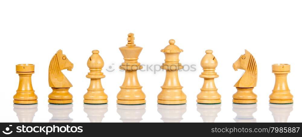 Wooden chess. Set of chess figures. Chess pieces isolated on white background.