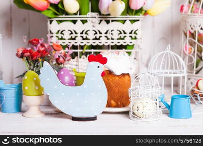 Wooden chicken - Easter decoration on the table. Easter chicken