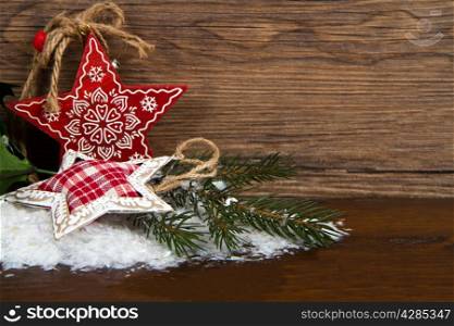 Wooden christmas star decoration on wooden background