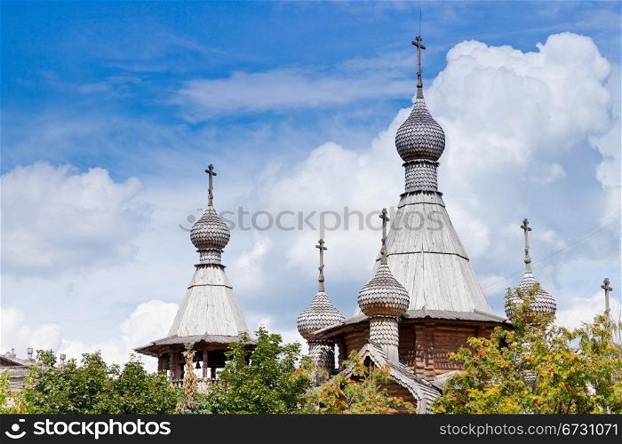 wooden churches of Russia under blue sky