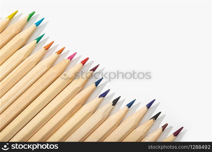 Wooden Colored pencils isolated on white background.Top view Copy space