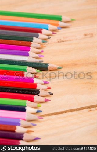 Wooden colorful pencils, on wooden table. colorful pencils