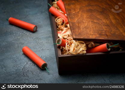 Wooden crate with red dynamite tnt sticks