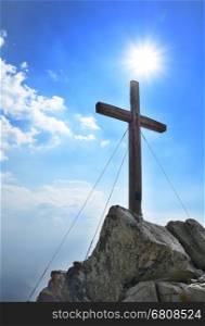 Wooden cross on top of the Predne Solisko peak in High Tatras mountain.