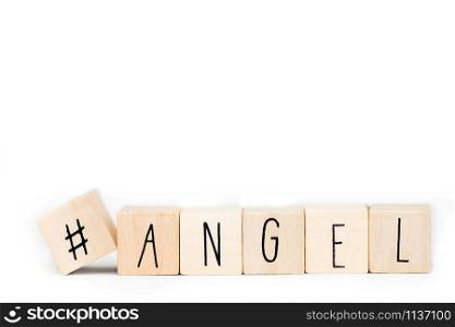 Wooden cubes with a hashtag and the word Angel isolated on white background, social media concept space for text. Wooden cubes with a hashtag and the word Angel isolated on white background, social media concept