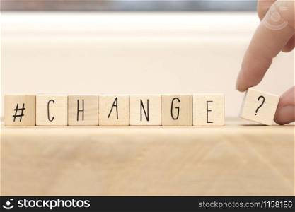 Wooden cubes with a hashtag and the word Change, social media concept space for text background. Wooden cubes with a hashtag and the word Change, social media concept space for text