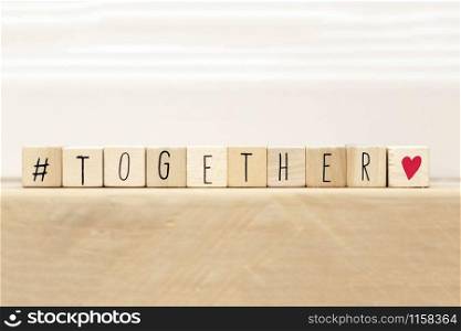 Wooden cubes with a hashtag and the word Together, social media concept space for text background. Wooden cubes with a hashtag and the word Together, social media concept space for text