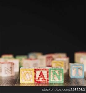wooden cubes with can title