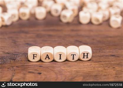 wooden cubes with word faith table. High resolution photo. wooden cubes with word faith table. High quality photo