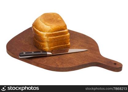 Wooden cutting board with sliced white bread and knife. Isolated over white.