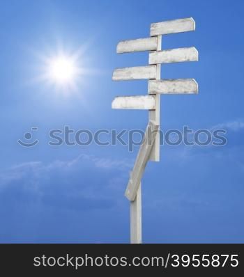 wooden direction sign with blank spaces for text on beautiful sunlight background