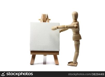 wooden doll with painters easel