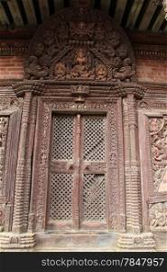 Wooden door of old temple in Bhaktapur, Nepal