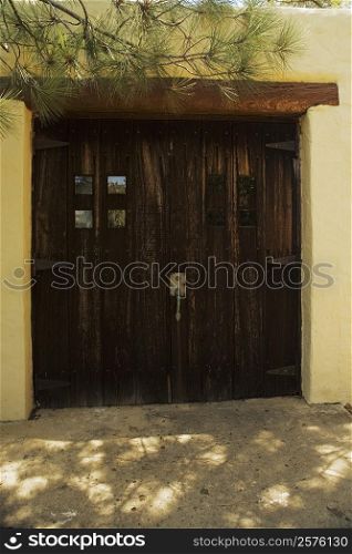 Wooden doors on a stucco building