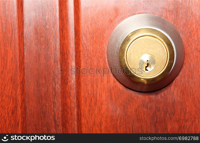 Wooden doorway with shiny keyhole nobody background