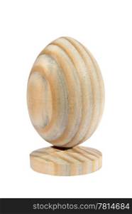 Wooden egg on support on the white background