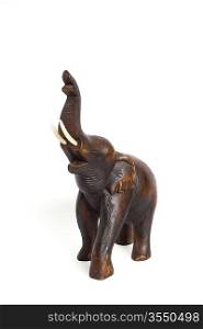 Wooden elephant figurine from Thailand isolated on white background