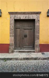 Wooden entrance door of a house, San Miguel de Allende, Guanajuato, Mexico